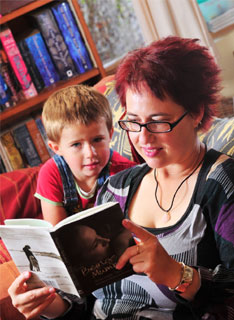 Anne-marie Taplin cuddling son George