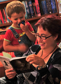 Anne-marie Taplin at home with son George