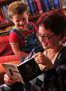 Anne-marie Taplin cuddling son George