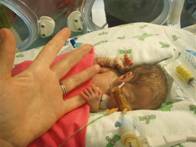 The grip of Elsie's tiny hand around my little finger